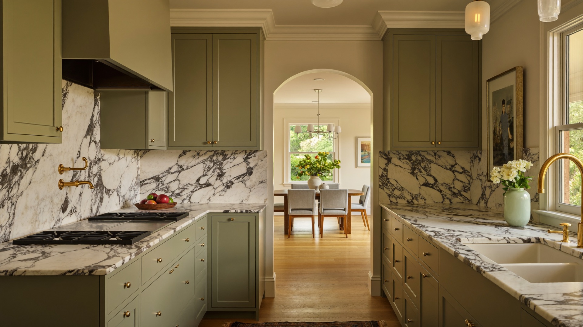Arcadia galley kitchen opened to one room, glazed-green inset cabinetry and honed Calacatta island